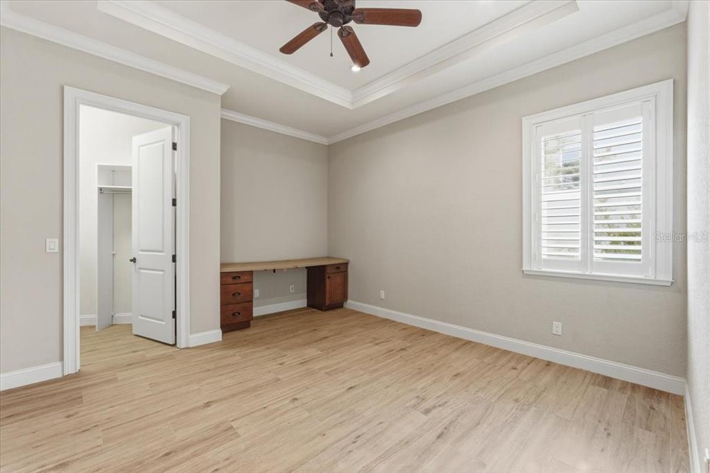 7 Spanish Moss Court Palm Coast, FL 32137 - Photo 42 of 66 an empty room with wooden floor and windows