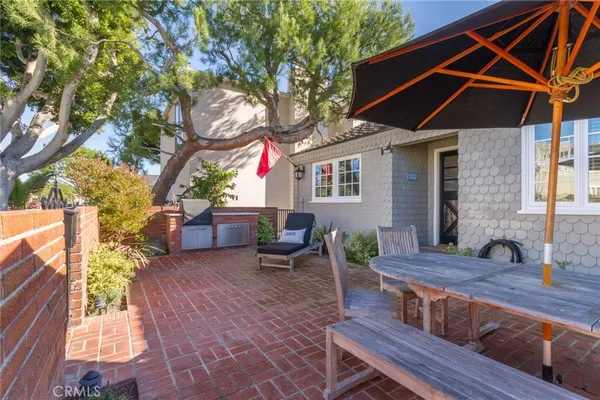 a backyard of a house with seating space
