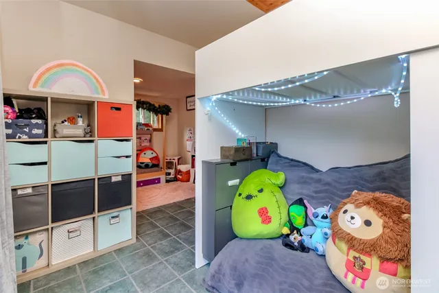 a utility room with painting and a table