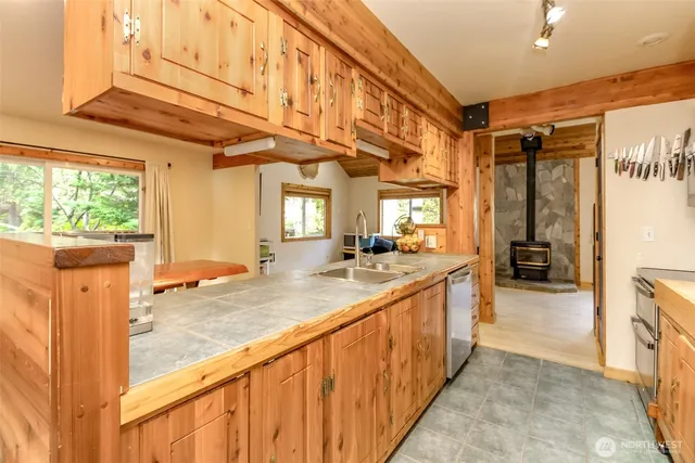 a bathroom with a sink a mirror and a bathtub