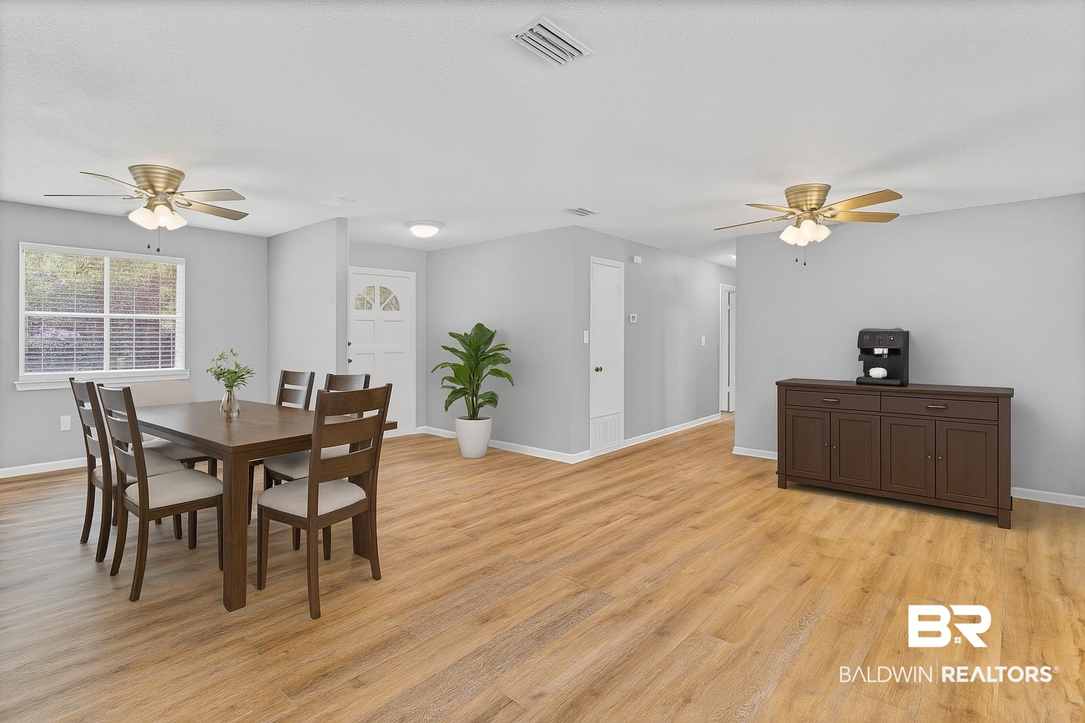 3304 Armond Drive Mobile, AL 36605 - Photo 10 of 62 Dining area with ceiling fan and light wood-style floors