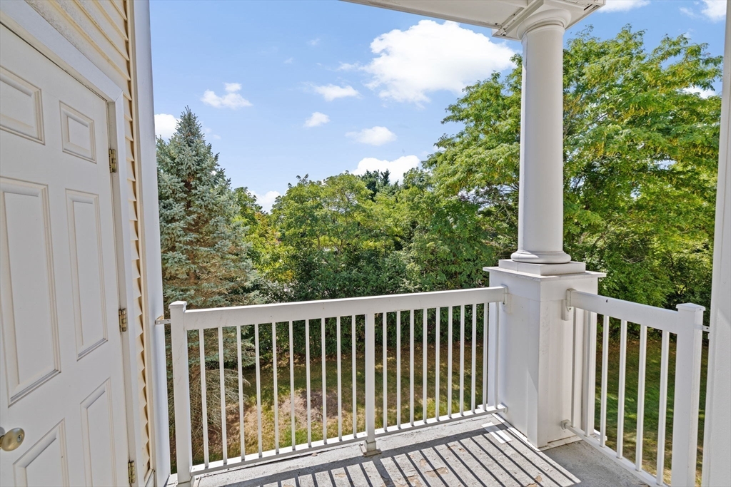 2204 Davenport Avenue, Unit 2204 Canton, MA 02021 - Photo 11 of 28 a front view of a house with a garden