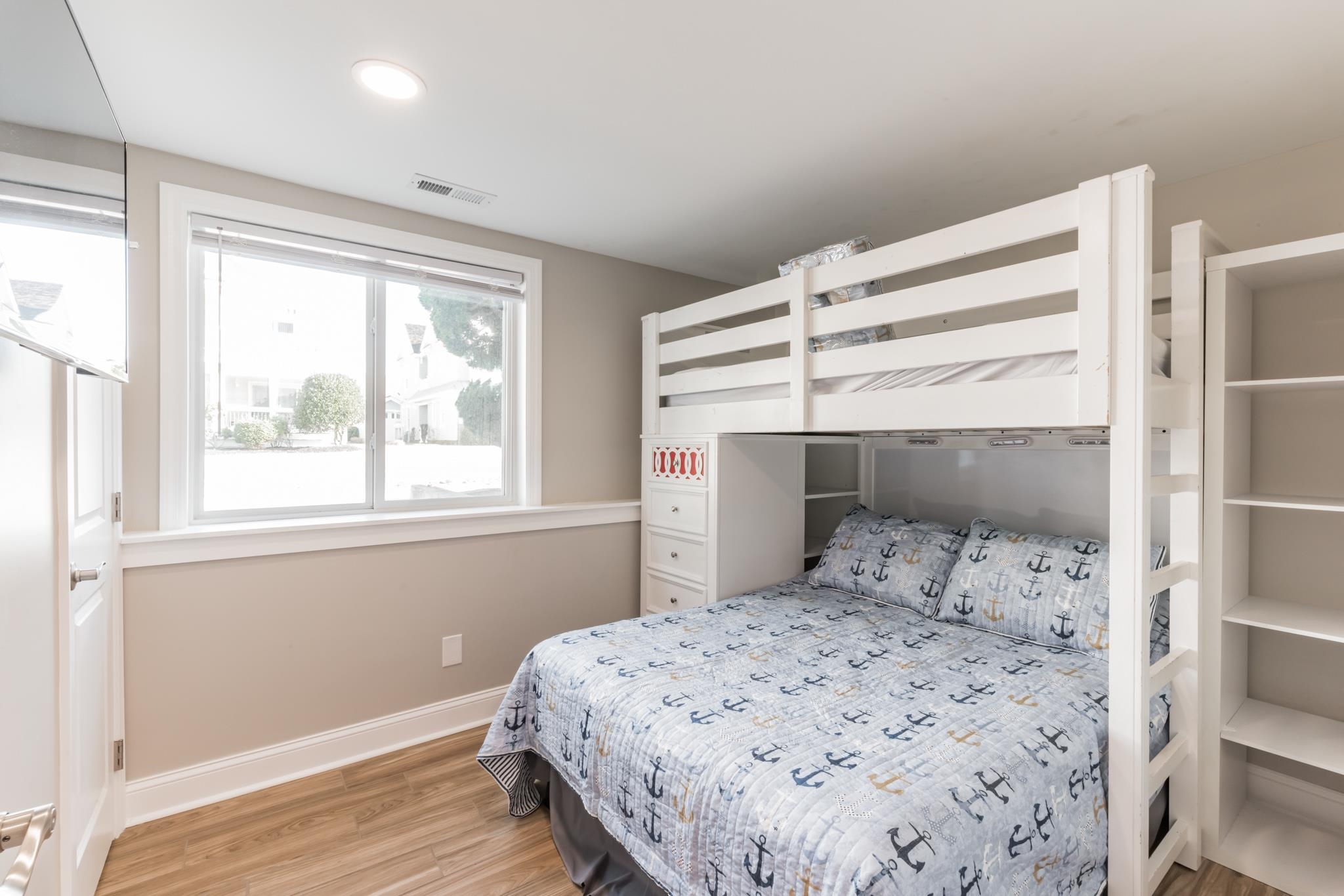 15 99th Street, Unit A Stone Harbor, NJ 08247 - Photo 22 of 41 a bedroom with a bed and a window