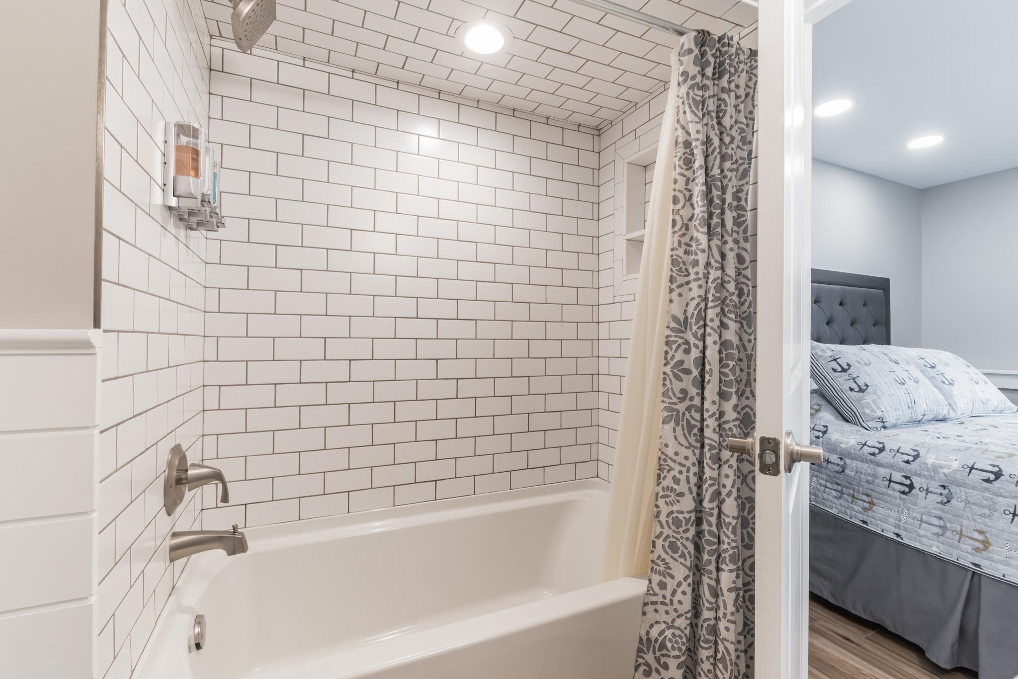 15 99th Street, Unit A Stone Harbor, NJ 08247 - Photo 25 of 41 a bathroom with a bathtub and shower