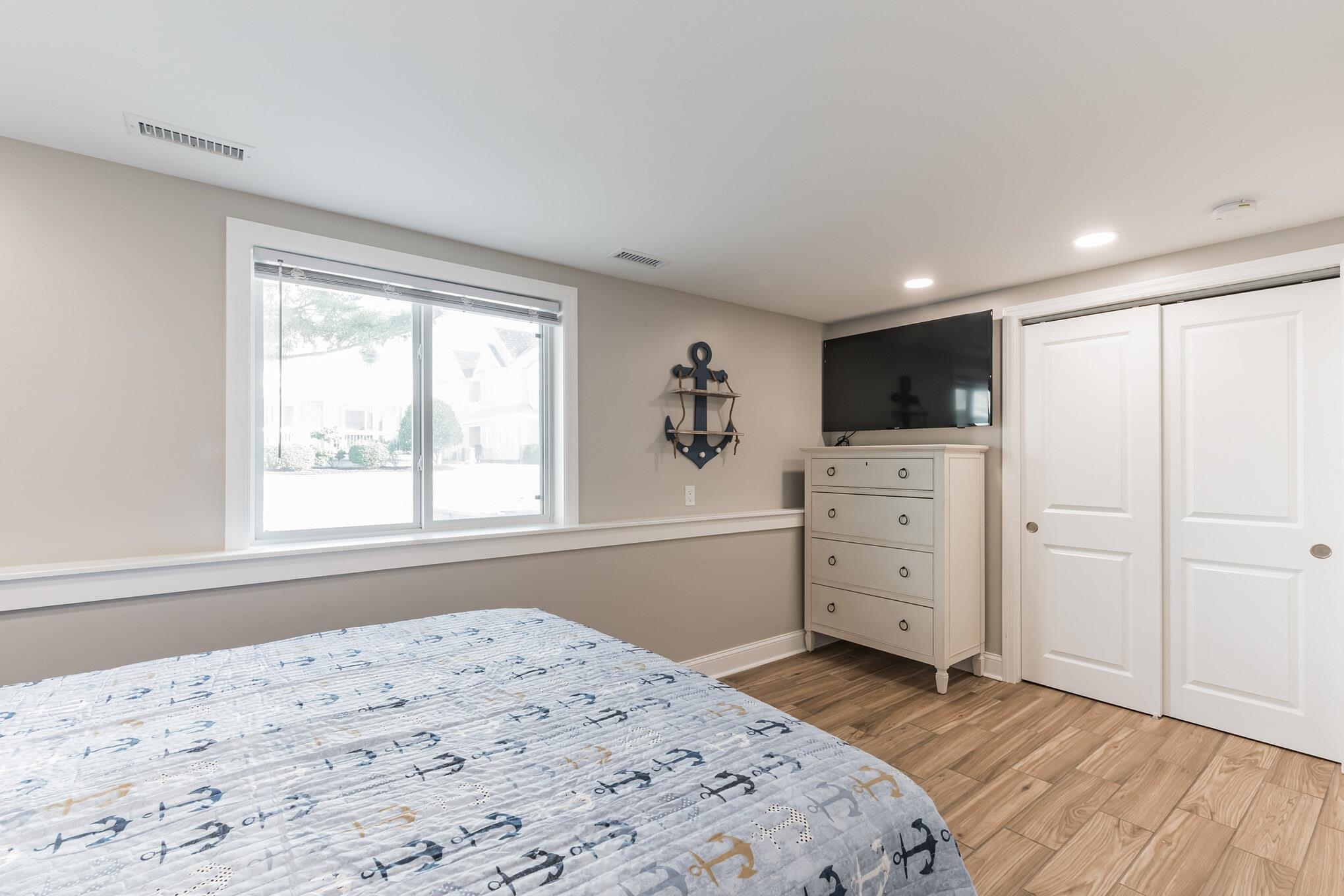 15 99th Street, Unit A Stone Harbor, NJ 08247 - Photo 27 of 41 a bedroom with a bed and a window
