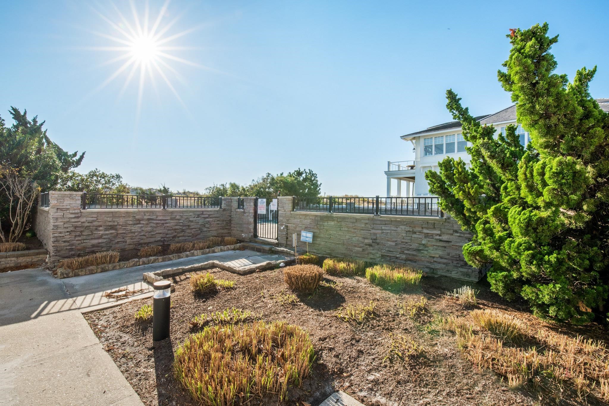 15 99th Street, Unit A Stone Harbor, NJ 08247 - Photo 30 of 41 a view of a backyard of the house