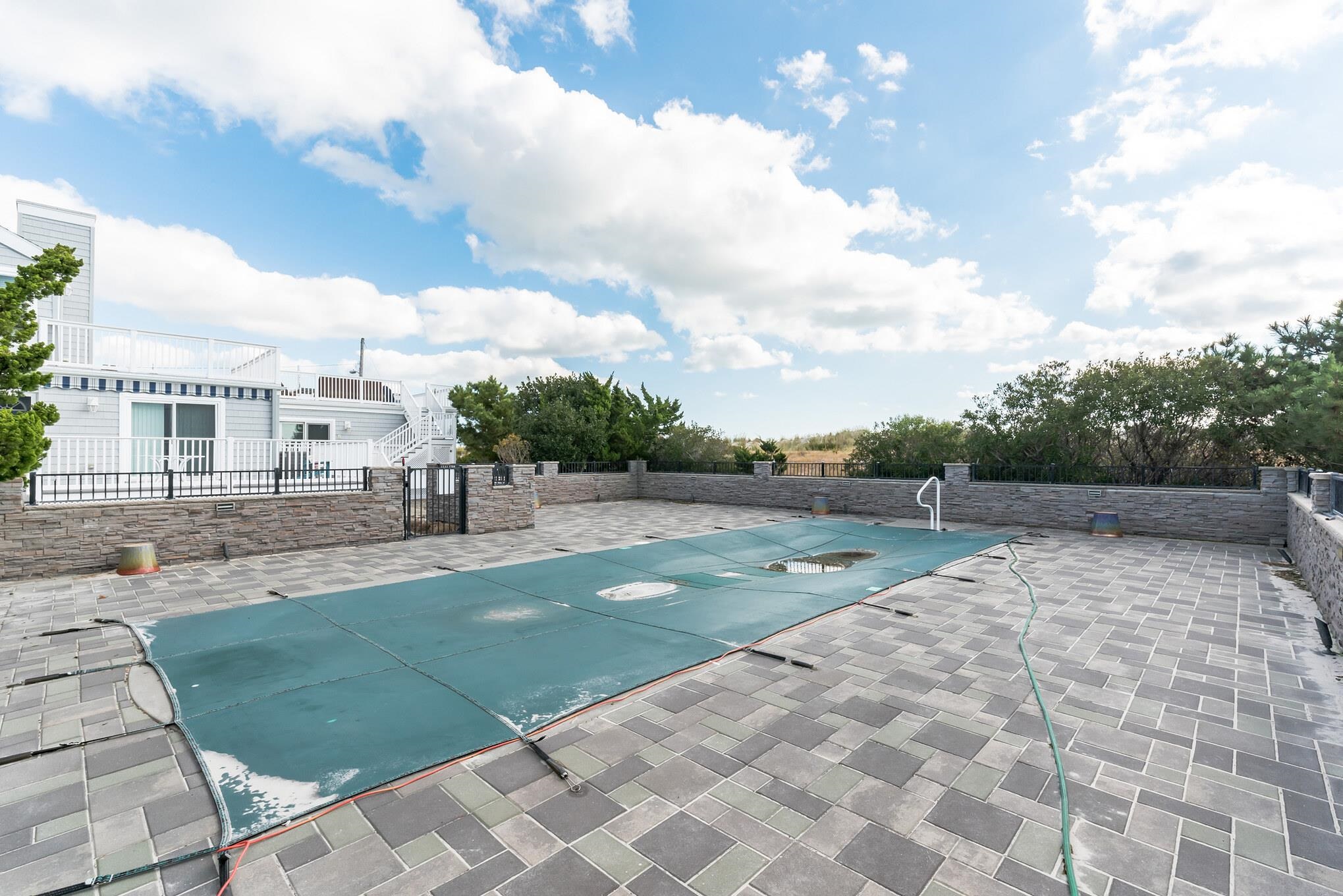 15 99th Street, Unit A Stone Harbor, NJ 08247 - Photo 32 of 41 a view of a backyard