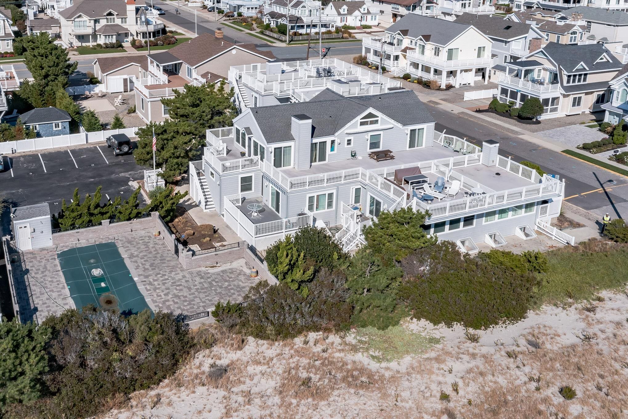 15 99th Street, Unit A Stone Harbor, NJ 08247 - Photo 33 of 41 an aerial view of residential houses with outdoor space