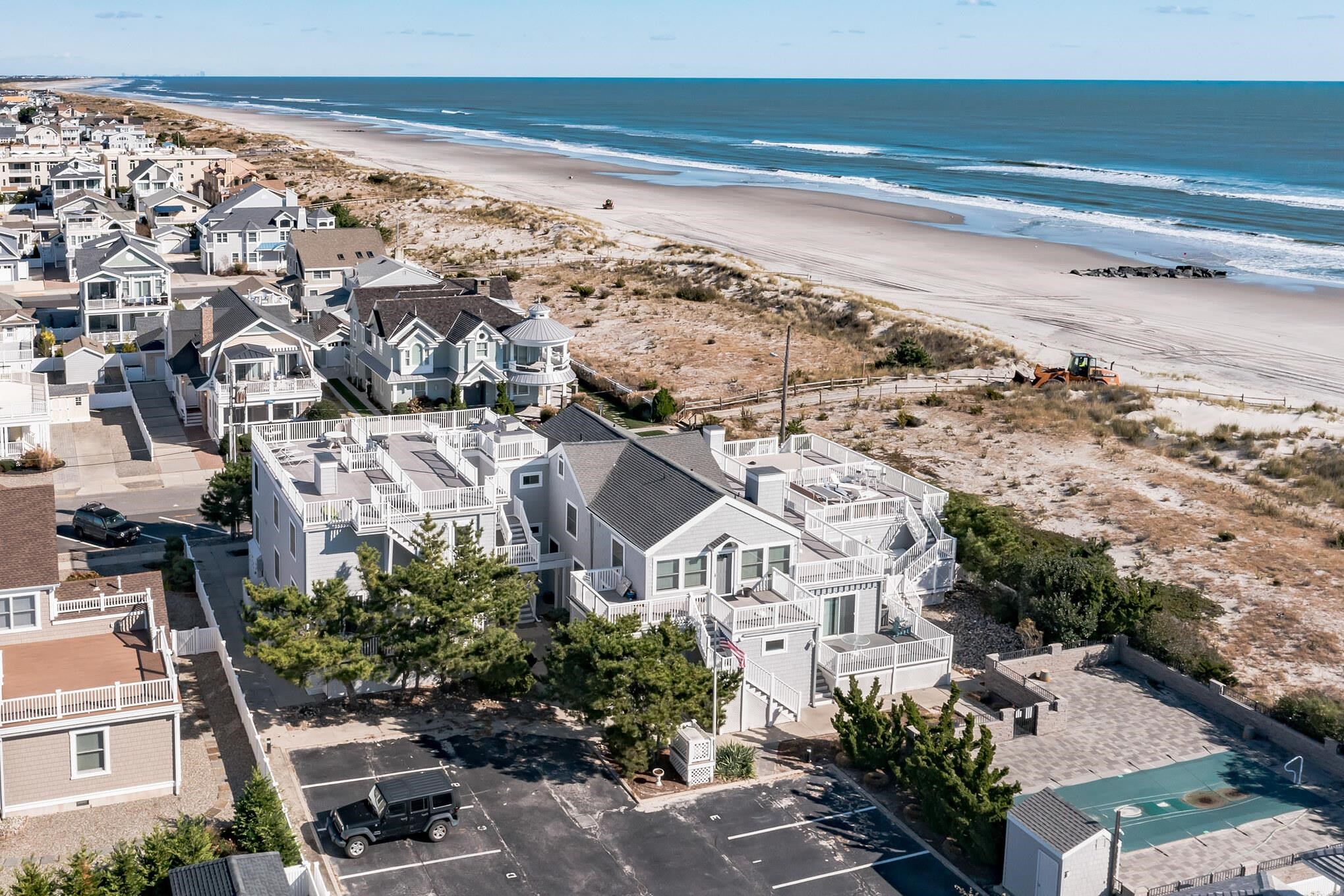 15 99th Street, Unit A Stone Harbor, NJ 08247 - Photo 39 of 41 a view of a building with an ocean view