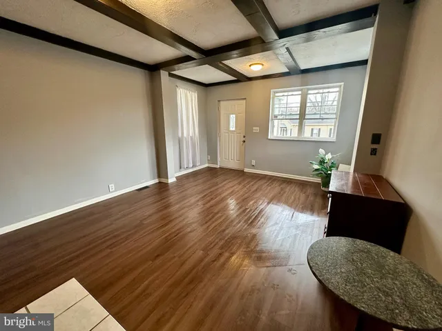 a view of livingroom with furniture and wooden floor