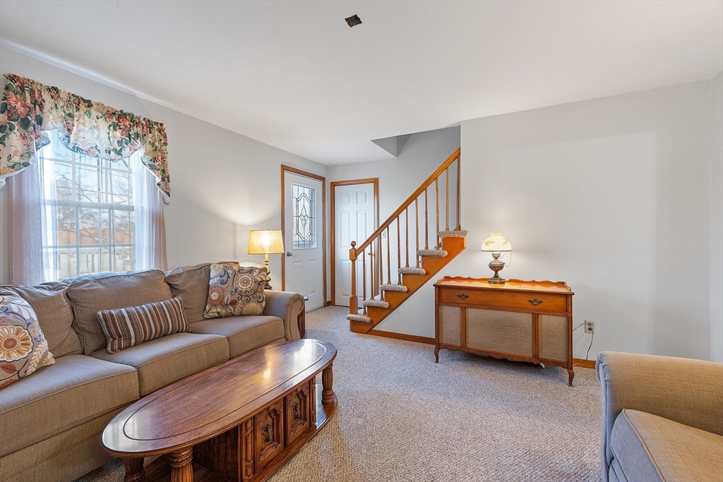 46 Woodruff Road Clinton, MA 01510 - Photo 12 of 38 a bedroom with furniture and a window