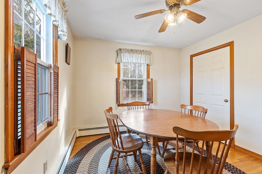46 Woodruff Road Clinton, MA 01510 - Photo 16 of 38 a view of a dining room with furniture window and wooden floor