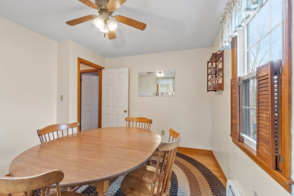 46 Woodruff Road Clinton, MA 01510 - Photo 18 of 38 a bedroom with a bed and a chandelier