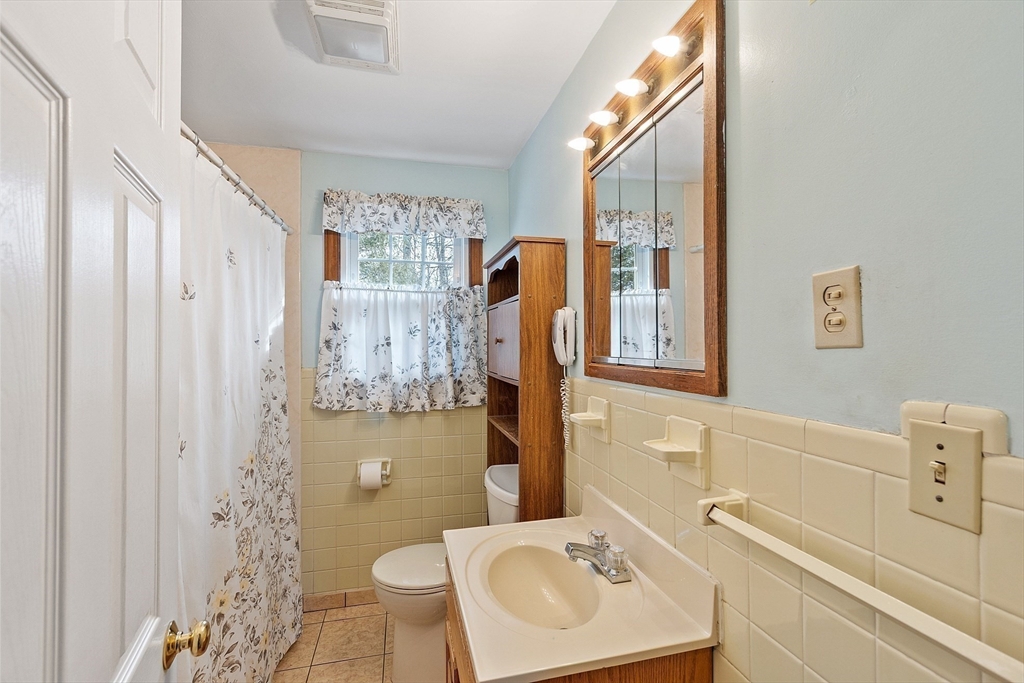 46 Woodruff Road Clinton, MA 01510 - Photo 21 of 38 a bathroom with a sink toilet and shower
