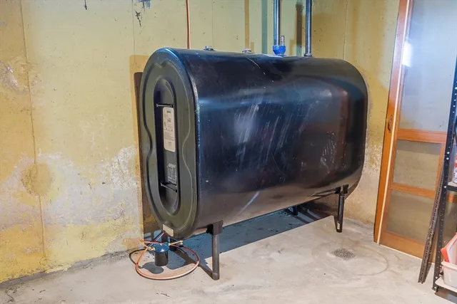 a view of a storage room with a lot of stuff and furniture