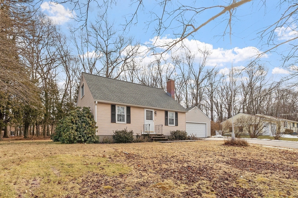 46 Woodruff Road Clinton, MA 01510 - Photo 38 of 38 a house that has a tree in front of it