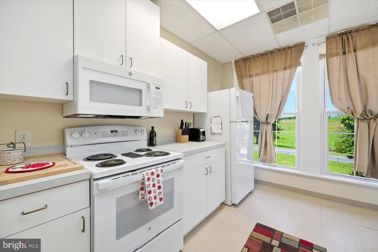38 Cherry Grove Road Middlebrook, VA 24459 - Photo 5 of 31 a kitchen with appliances cabinets and a sink