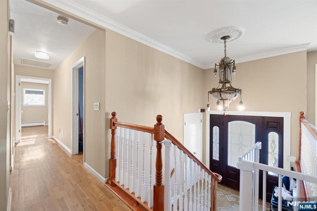 51 Anderson Avenue Englewood Cliffs, NJ 07632 - Photo 2 of 46 a view of a hallway with wooden floor and staircase