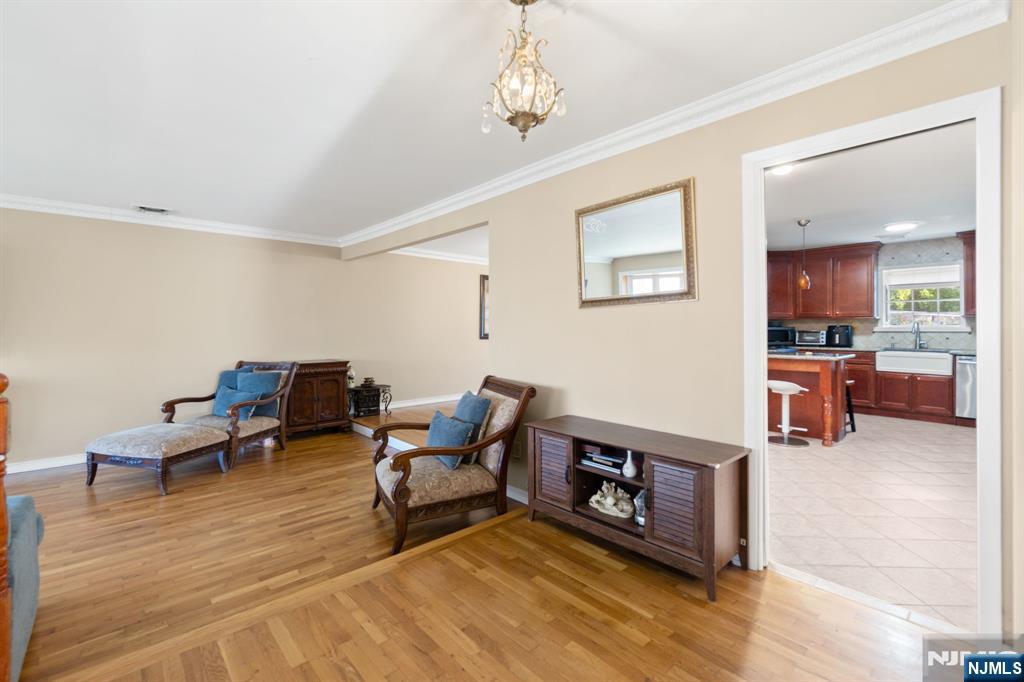 51 Anderson Avenue Englewood Cliffs, NJ 07632 - Photo 3 of 46 a living room with furniture and a wooden floor