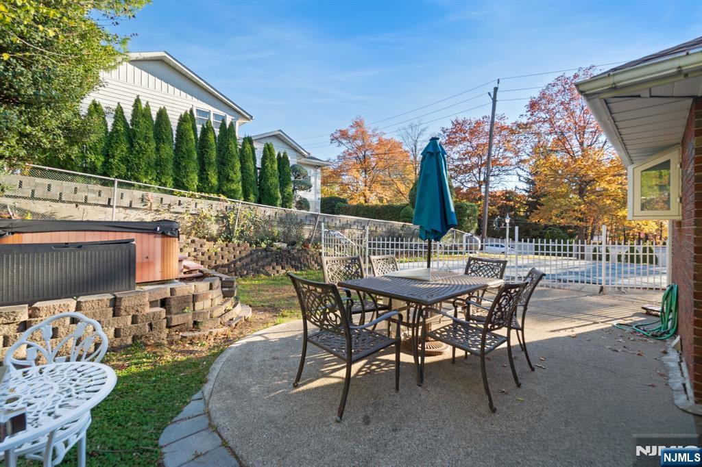 51 Anderson Avenue Englewood Cliffs, NJ 07632 - Photo 32 of 46 a view of a patio with table and chairs and potted plants