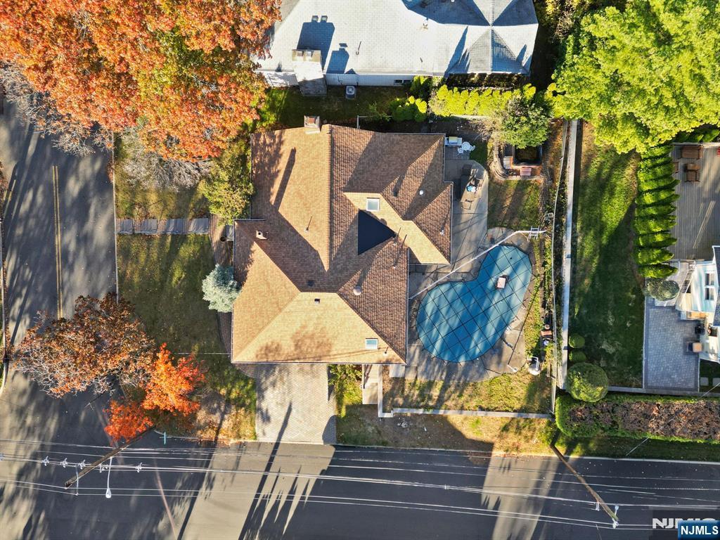 51 Anderson Avenue Englewood Cliffs, NJ 07632 - Photo 40 of 46 an aerial view of a house with a yard and balcony