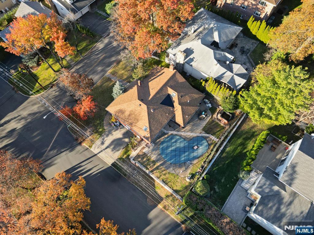 51 Anderson Avenue Englewood Cliffs, NJ 07632 - Photo 41 of 46 an aerial view of a house with a yard and wooden fence