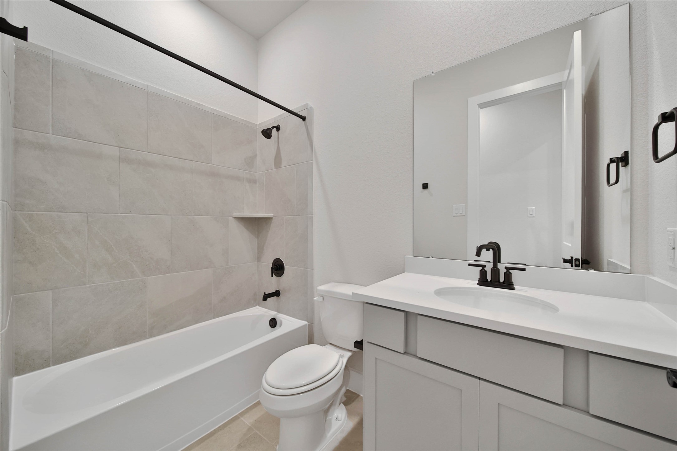 4610 Magnolia Bend Drive Rosharon, TX 77583 - Photo 36 of 48 a bathroom with a sink a toilet and a bathtub