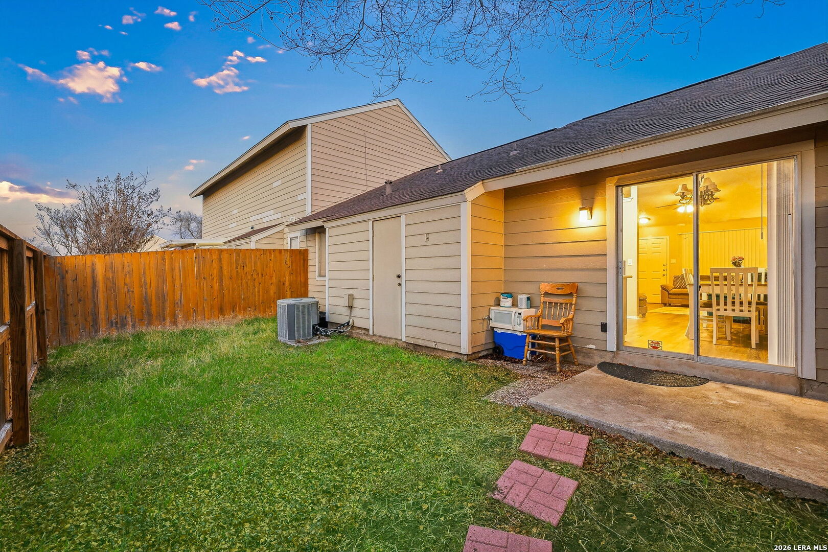9140 Timber Path, Unit 2502 San Antonio, TX 78250 - Photo 18 of 26 a view of a house with backyard and sitting area