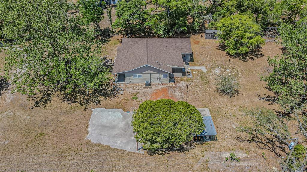17851 Oxenham Avenue Spring Hill, FL 34610 - Photo 4 of 31 an aerial view of a house