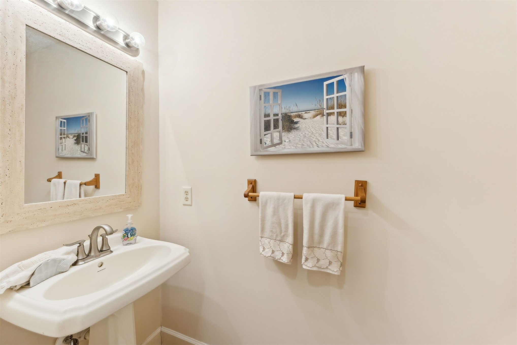 59 Laurel Oak Road Fernandina Beach, FL 32034 - Photo 18 of 54 a bathroom with a sink and a mirror