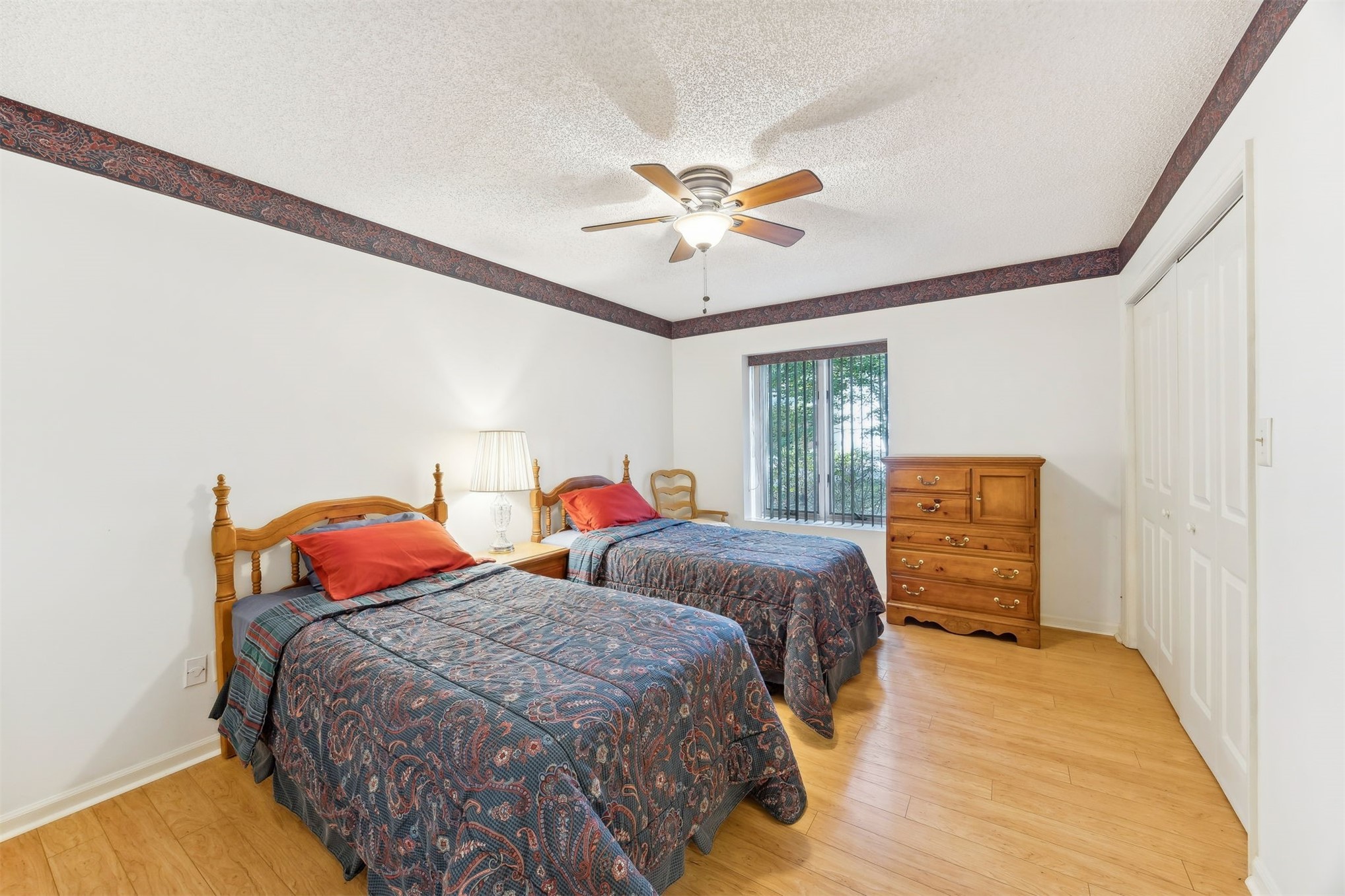 59 Laurel Oak Road Fernandina Beach, FL 32034 - Photo 19 of 54 a bedroom with two beds and ceiling fan