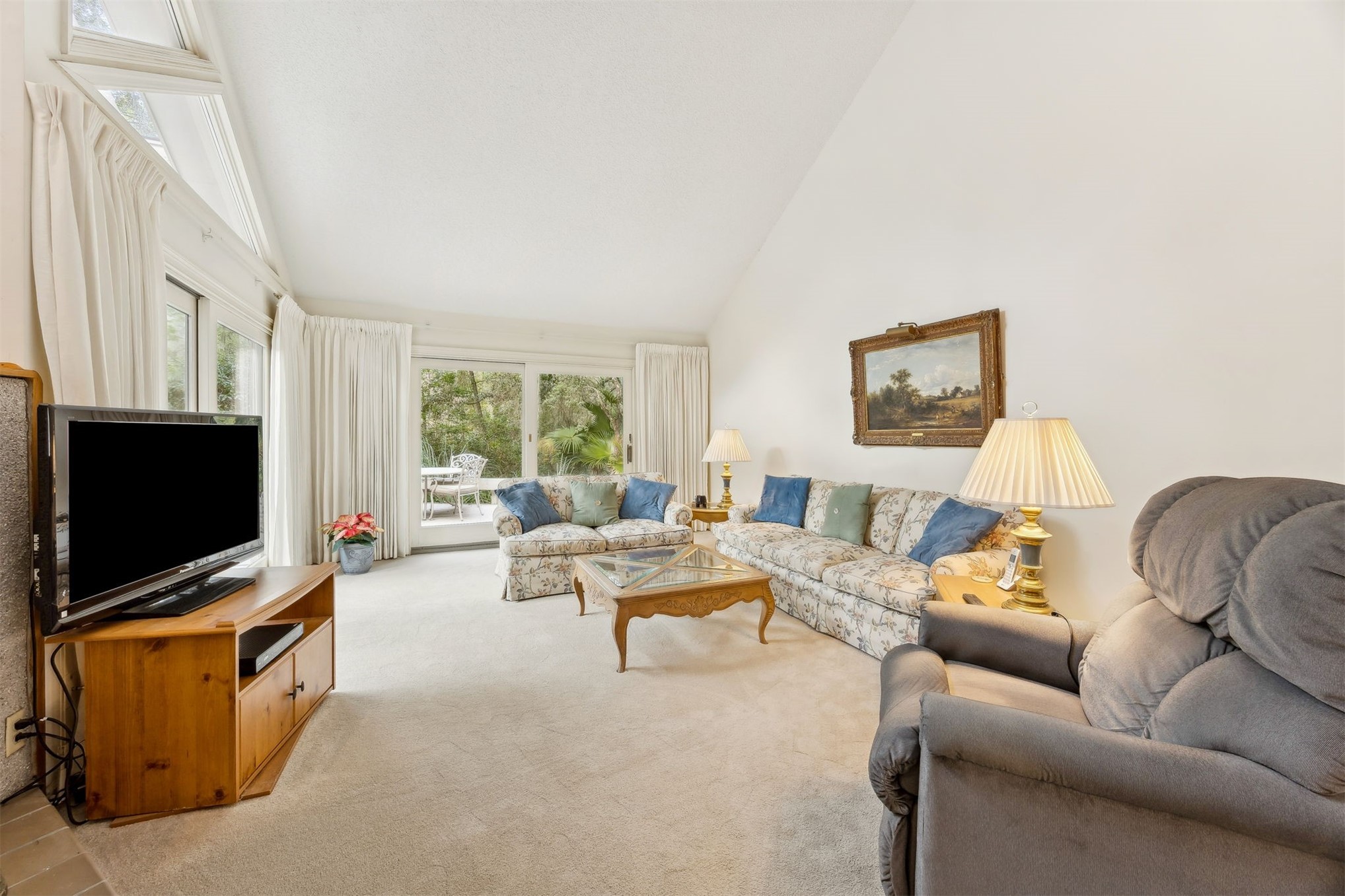 59 Laurel Oak Road Fernandina Beach, FL 32034 - Photo 5 of 54 a living room with furniture and a flat screen tv