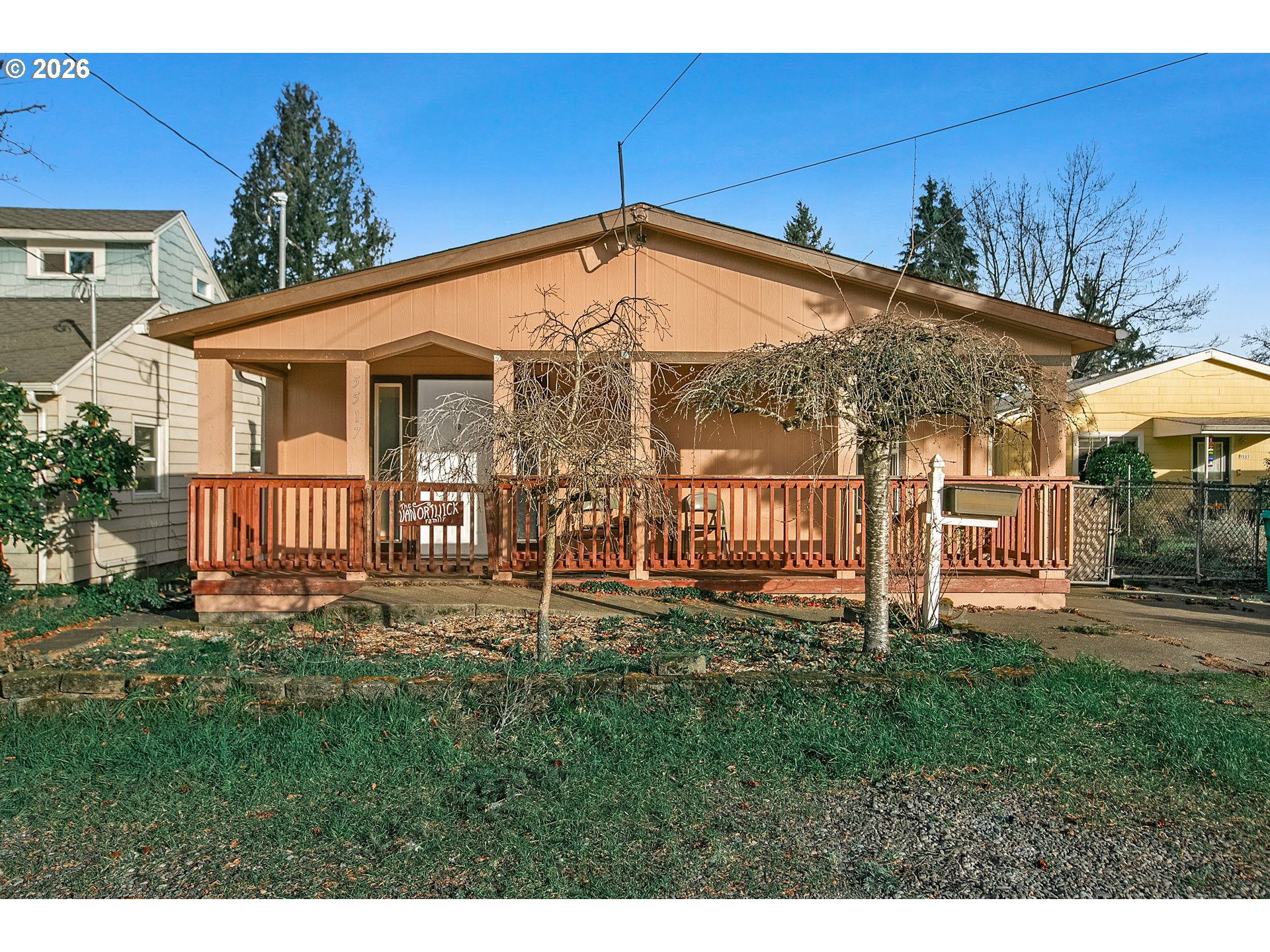 5517 Southeast Lexington Street Portland, OR 97206 - Photo 1 of 29 a view of a house with a yard
