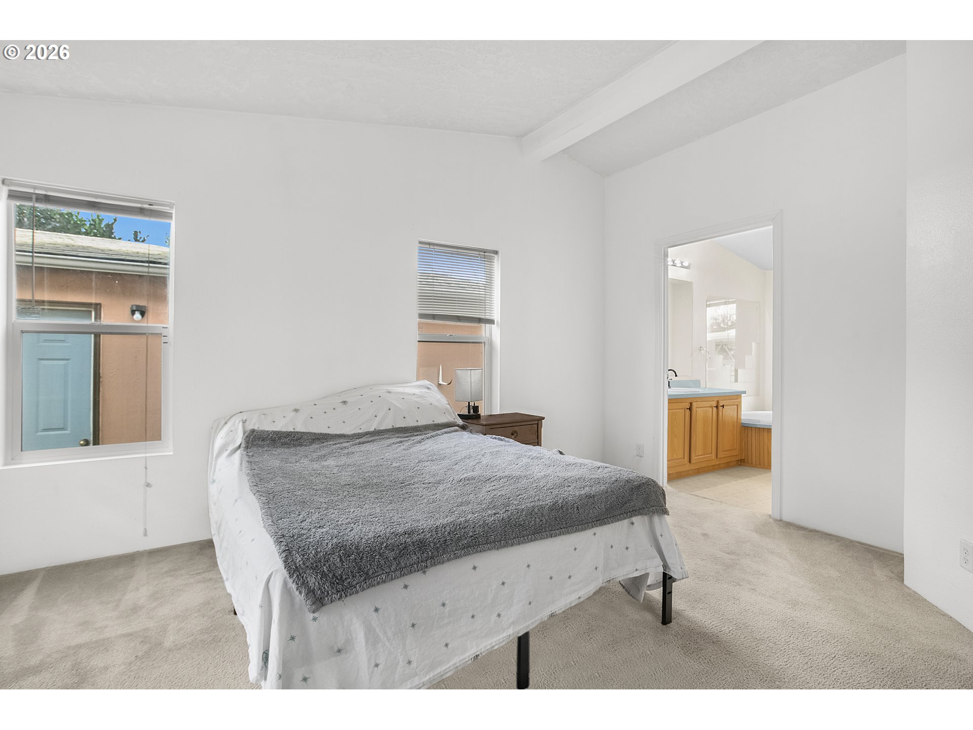 5517 Southeast Lexington Street Portland, OR 97206 - Photo 17 of 29 a living room with a bed and furniture
