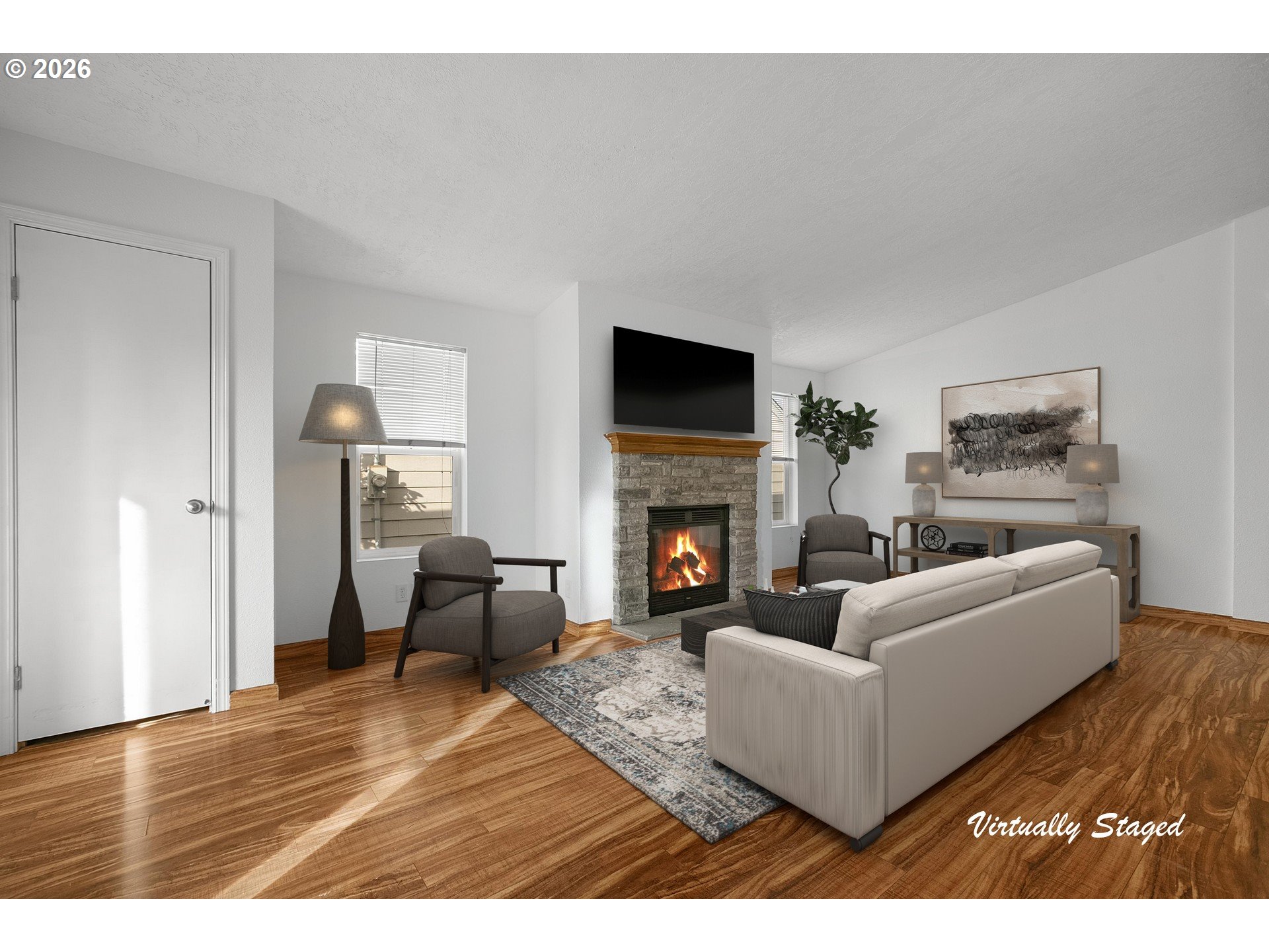 5517 Southeast Lexington Street Portland, OR 97206 - Photo 27 of 29 a living room with furniture a fireplace and a flat screen tv