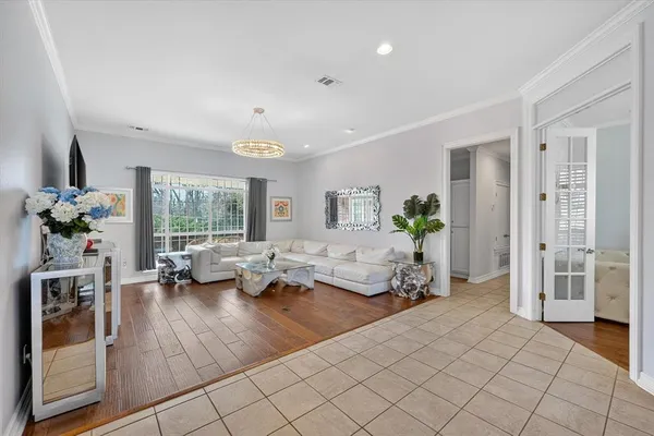 a living room with furniture and a table