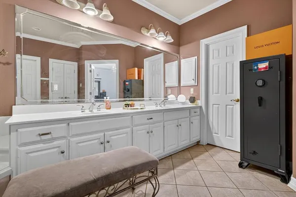 a spacious bathroom with a granite countertop sink a mirror and a