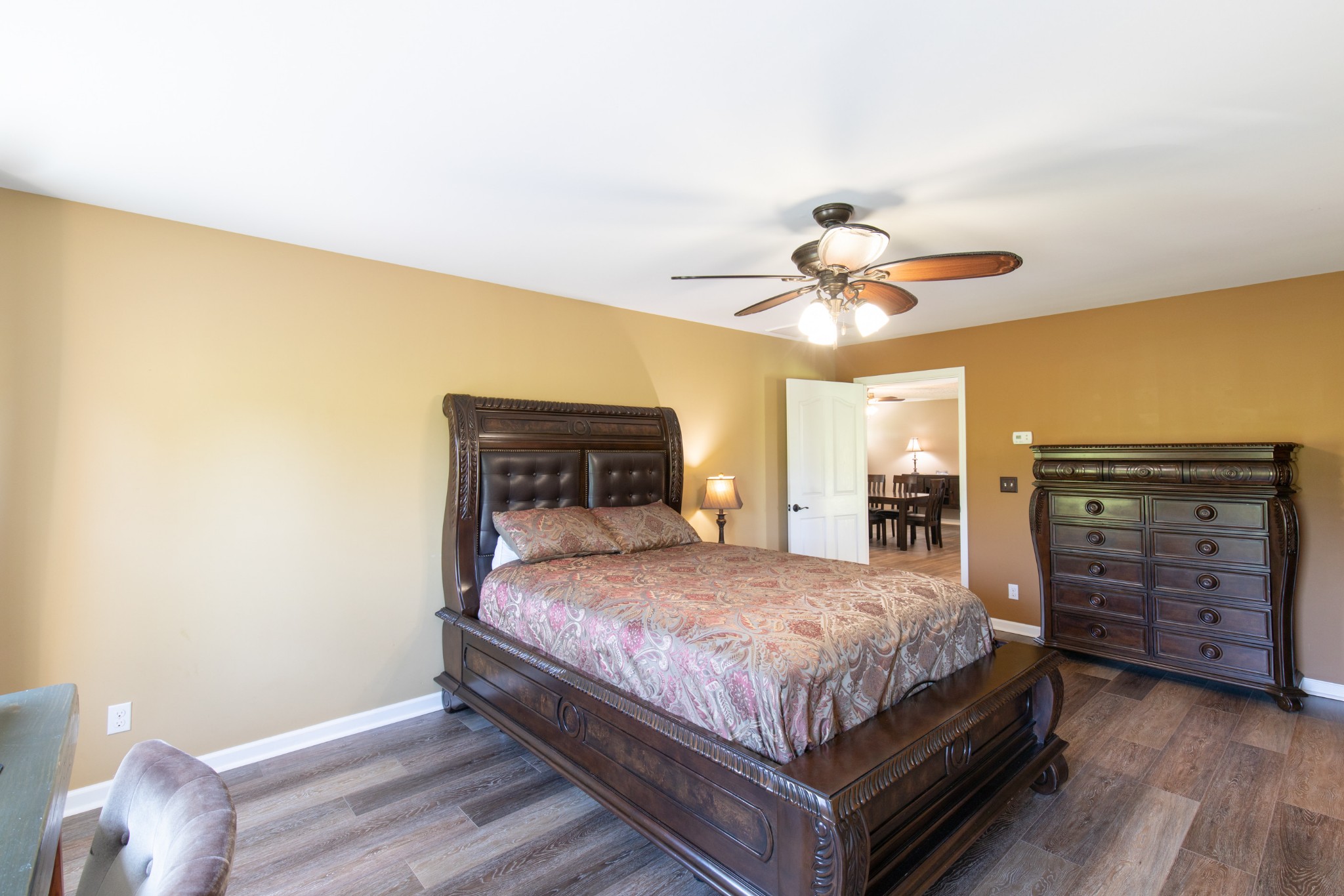 6022 Wayman Dunn Road Springfield, TN 37172 - Photo 16 of 35 a bedroom with a bed and dresser