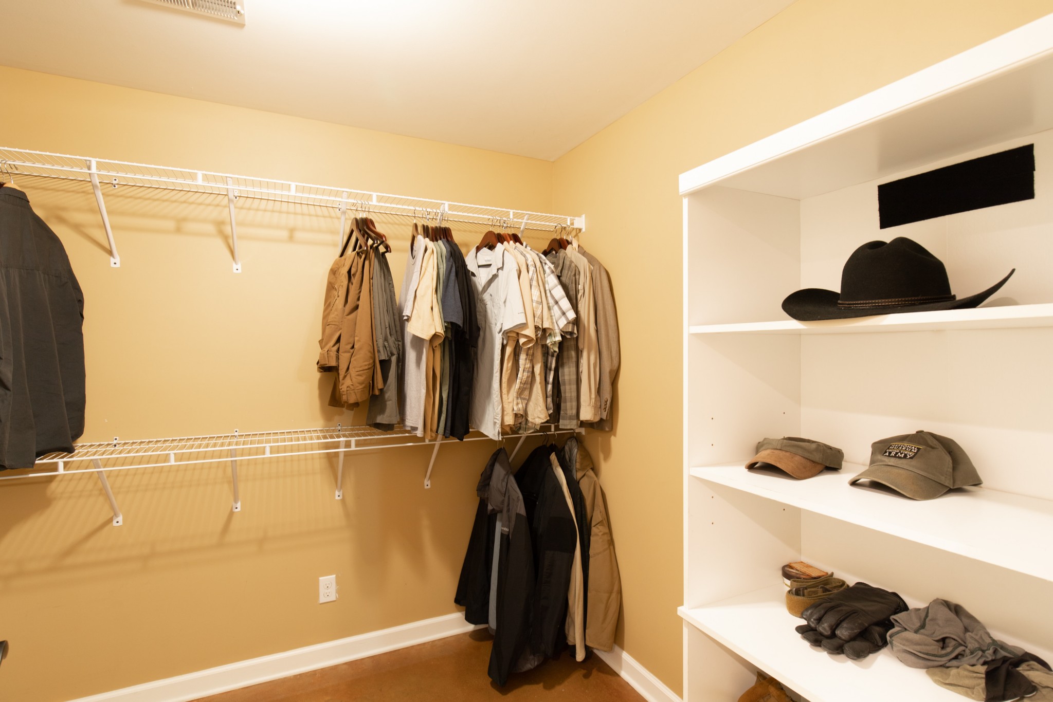 6022 Wayman Dunn Road Springfield, TN 37172 - Photo 18 of 35 a view of walk in closet with clothes and shoes