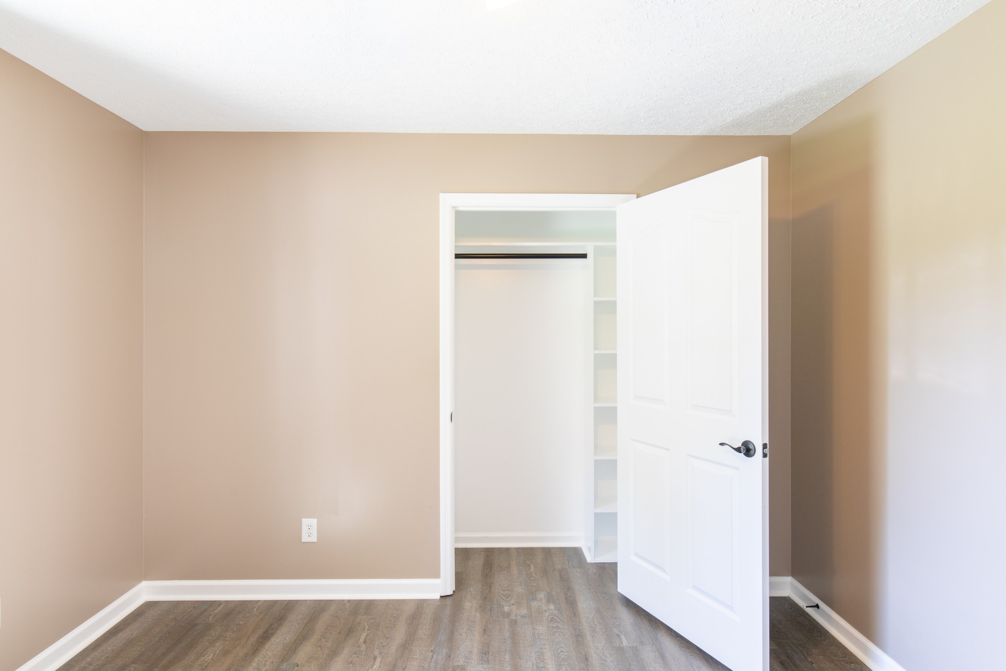 6022 Wayman Dunn Road Springfield, TN 37172 - Photo 23 of 35 a view of an empty room with wooden floor
