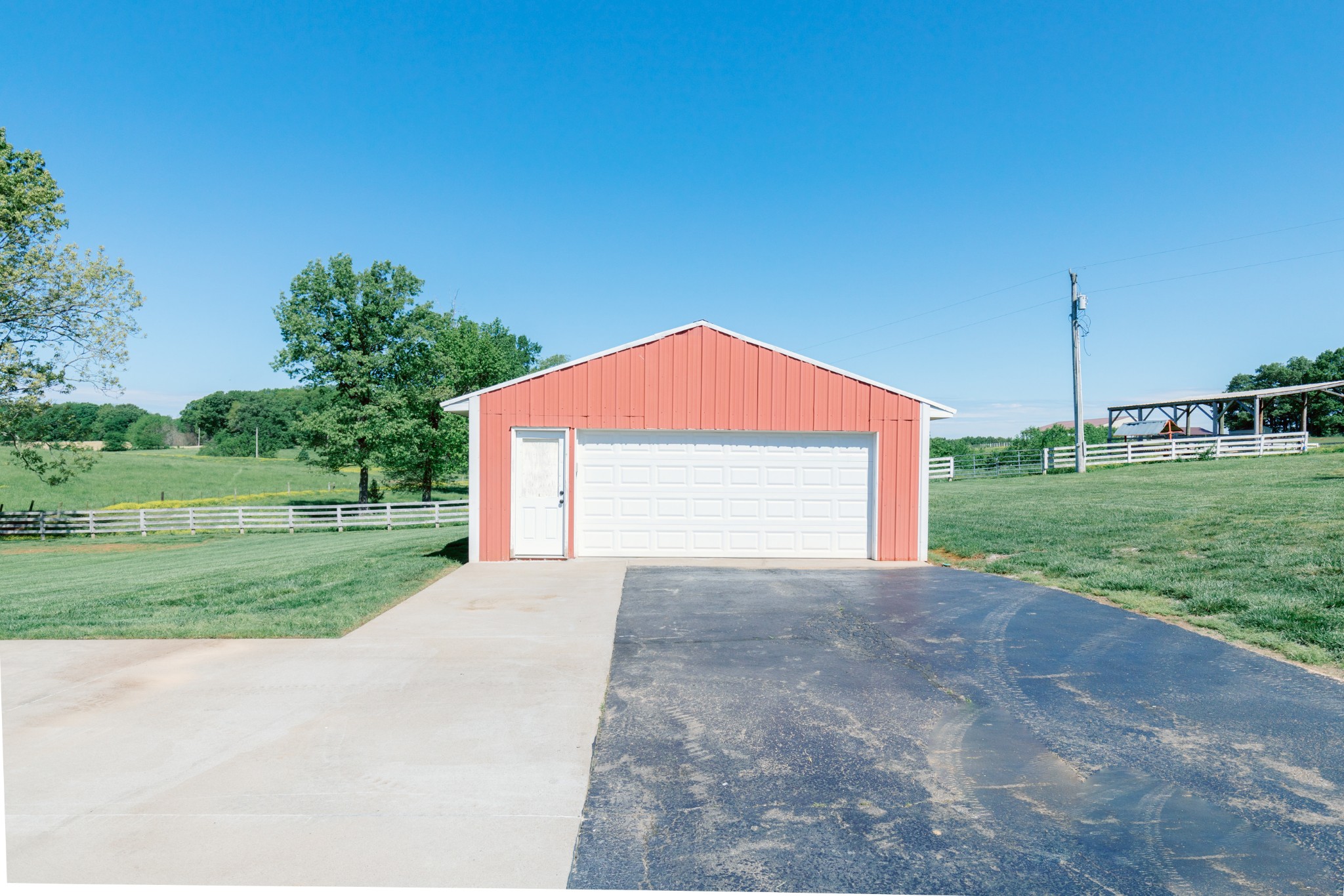 6022 Wayman Dunn Road Springfield, TN 37172 - Photo 5 of 35 a view of a house with a yard and garage
