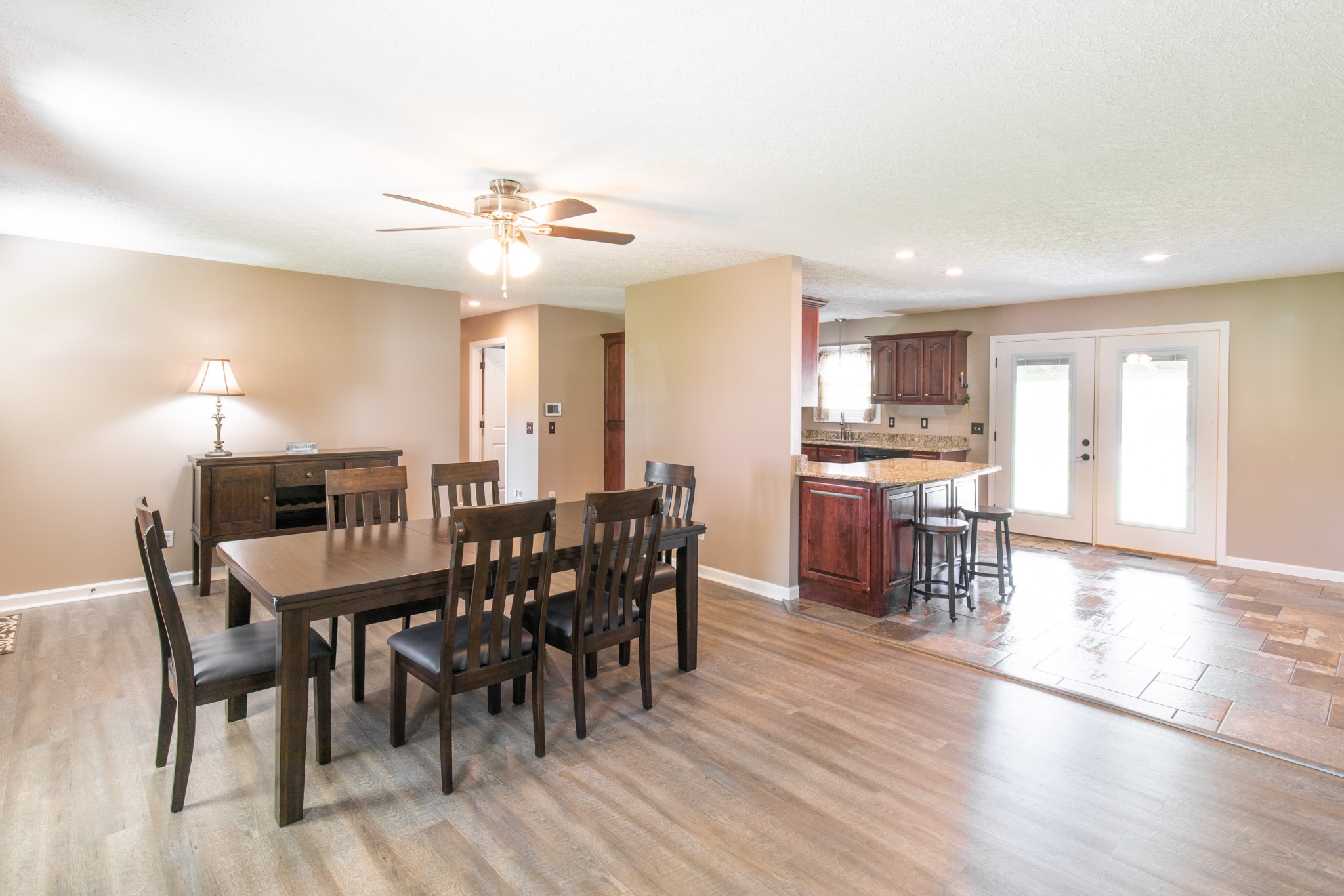 6022 Wayman Dunn Road Springfield, TN 37172 - Photo 8 of 35 a view of a dining room with furniture and wooden floor