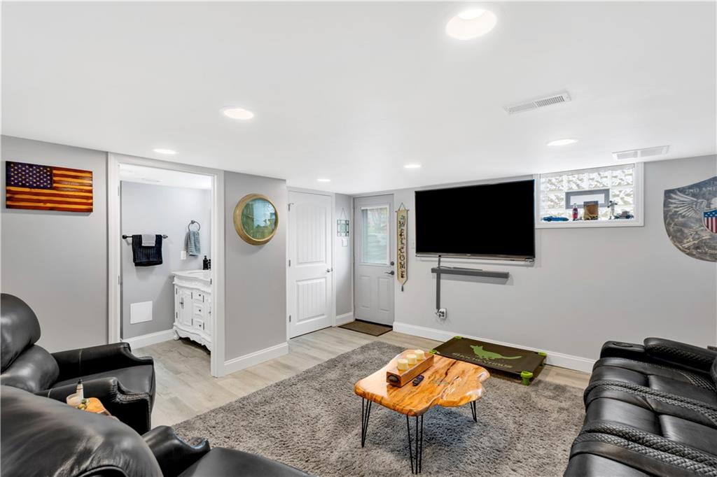 6096 Kemerer Hollow Road Export, PA 15632 - Photo 21 of 47 All NEW EVERYTHING. Lower level designed for a primary suite with walk in closet, full custom bathroom with walk out. Use it as your primary or family room