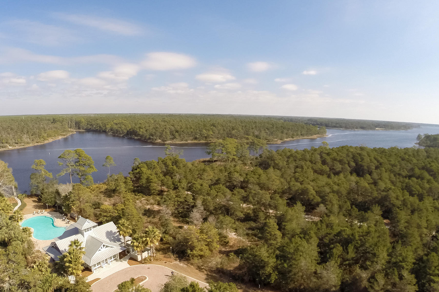 Lot 142 West Grande Pointe Dr Inlet Beach Inlet Beach, FL 32461 - Photo 11 of 11 a view of a lake with houses in the back