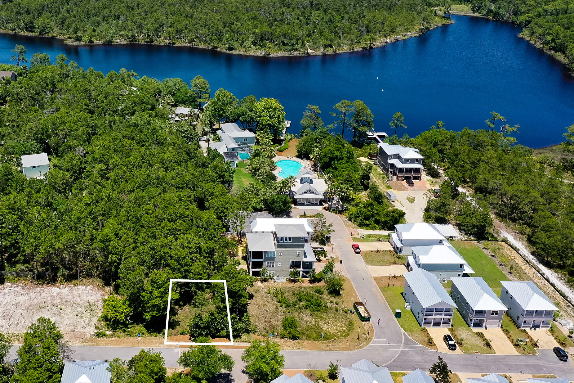 Lot 142 West Grande Pointe Dr Inlet Beach Inlet Beach, FL 32461 - Photo 3 of 11 an aerial view of a house with garden space and lake view