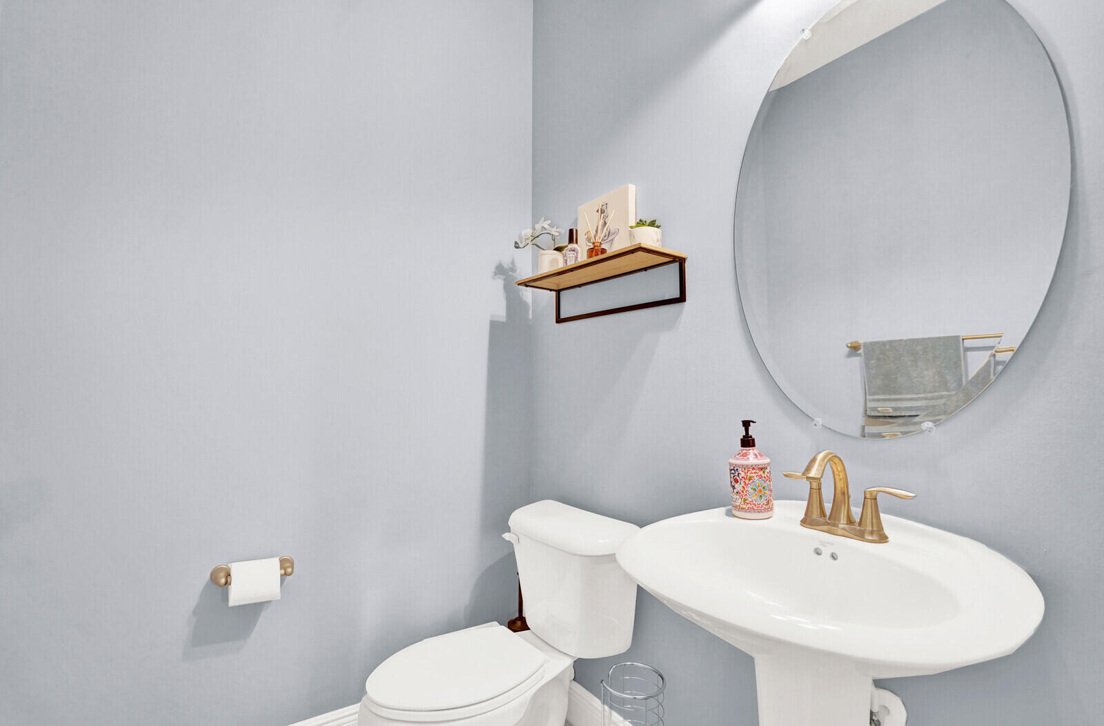 2005 Foxtail View Court West Palm Beach, FL 33411 - Photo 17 of 51 a white toilet sitting next to a bathroom sink