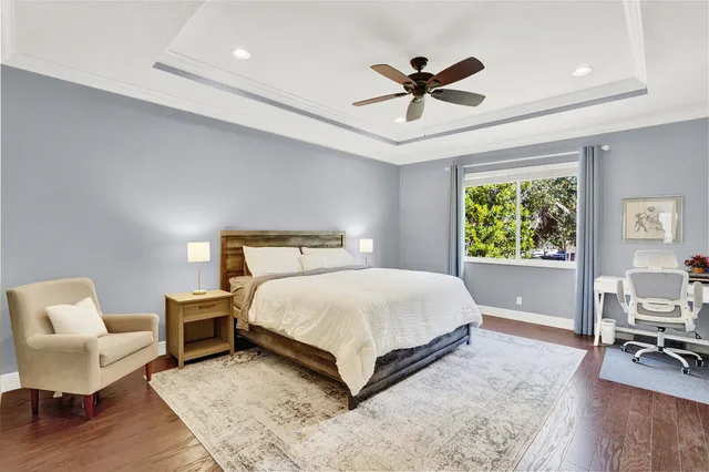 a bedroom with a bed furniture and a window