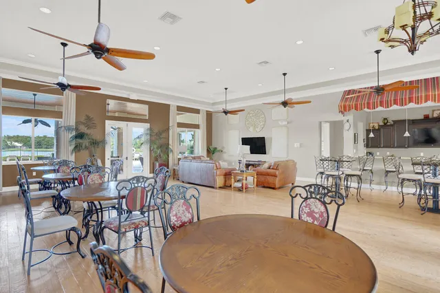 a living room with lots of furniture and a flat screen tv