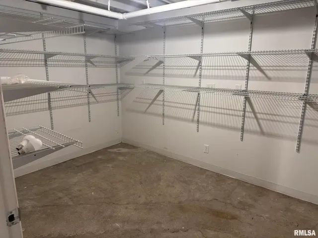 a view of a room with racks on the wall
