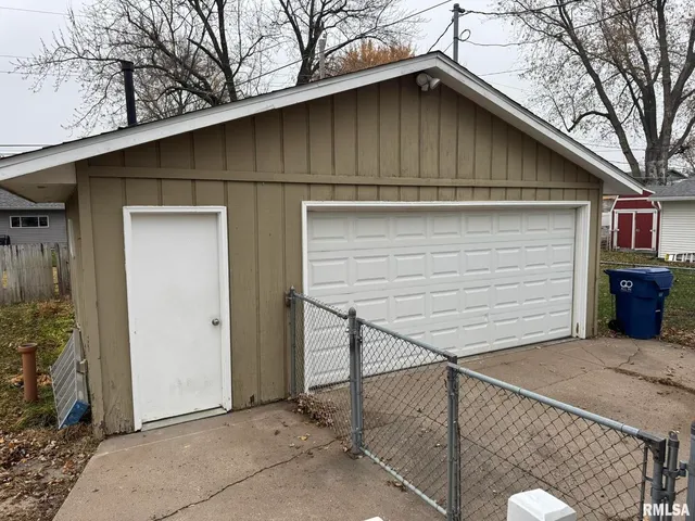 a view of a house with a garage